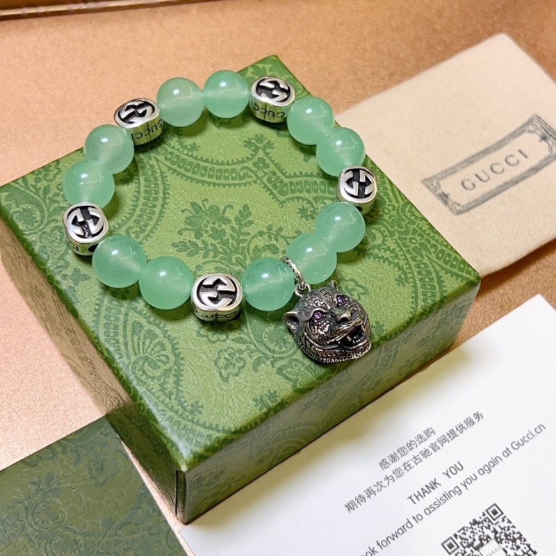 G*u*i bracelets